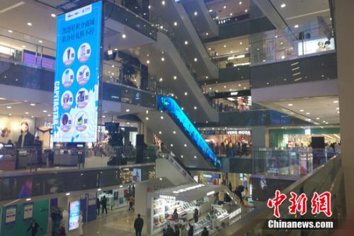 图为北京西城区一家商场。 谢艺观 摄